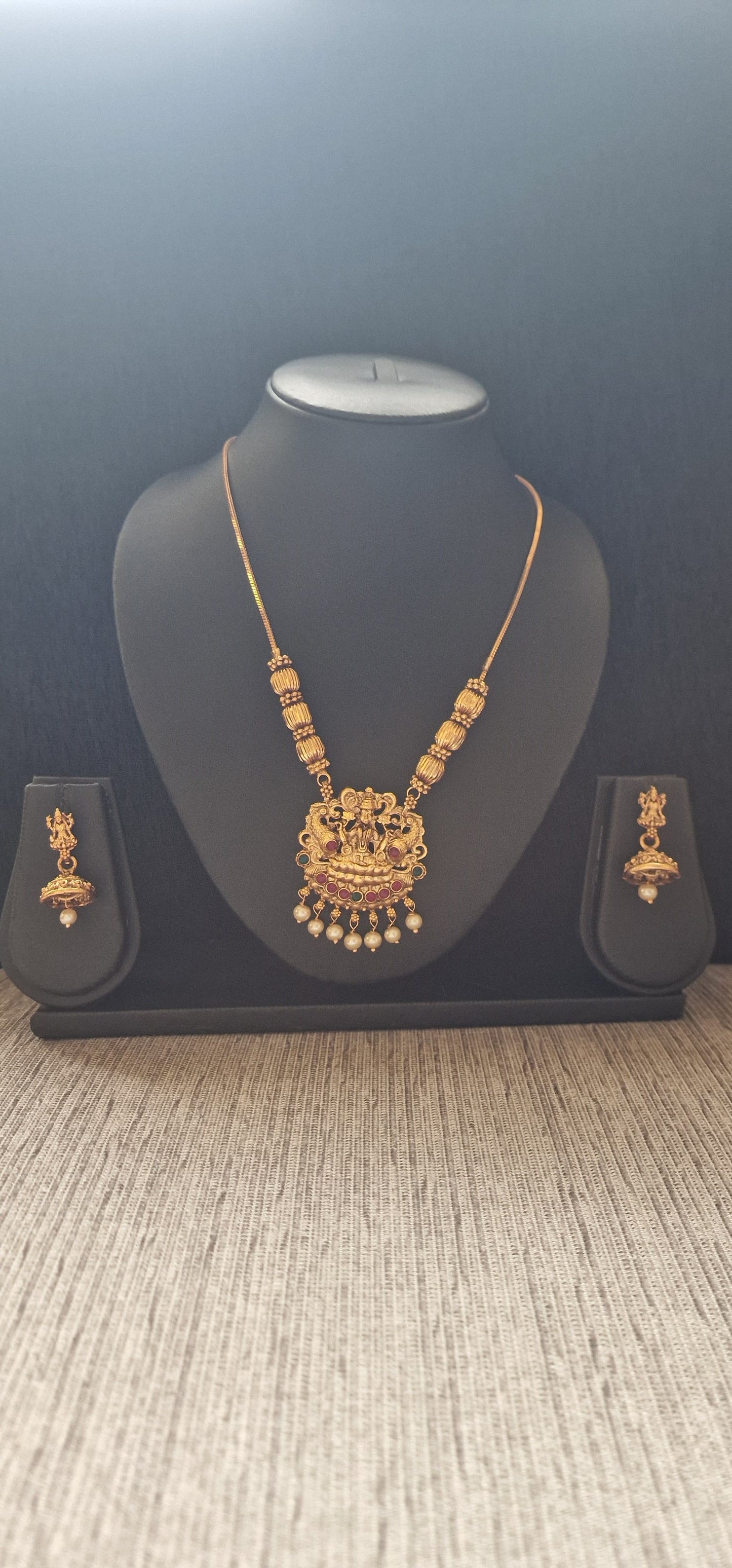 Adjustable long chain with lekshmi pendent with cute jimukha
