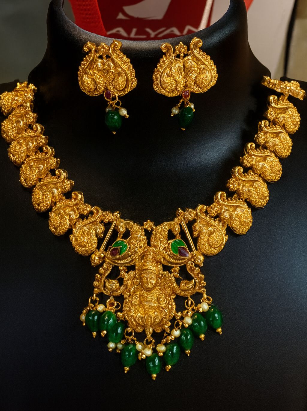 Temple Necklace Set Adorned with Emerald Drops