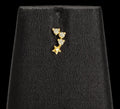 Small three white stone with golden star nose pin and second stud