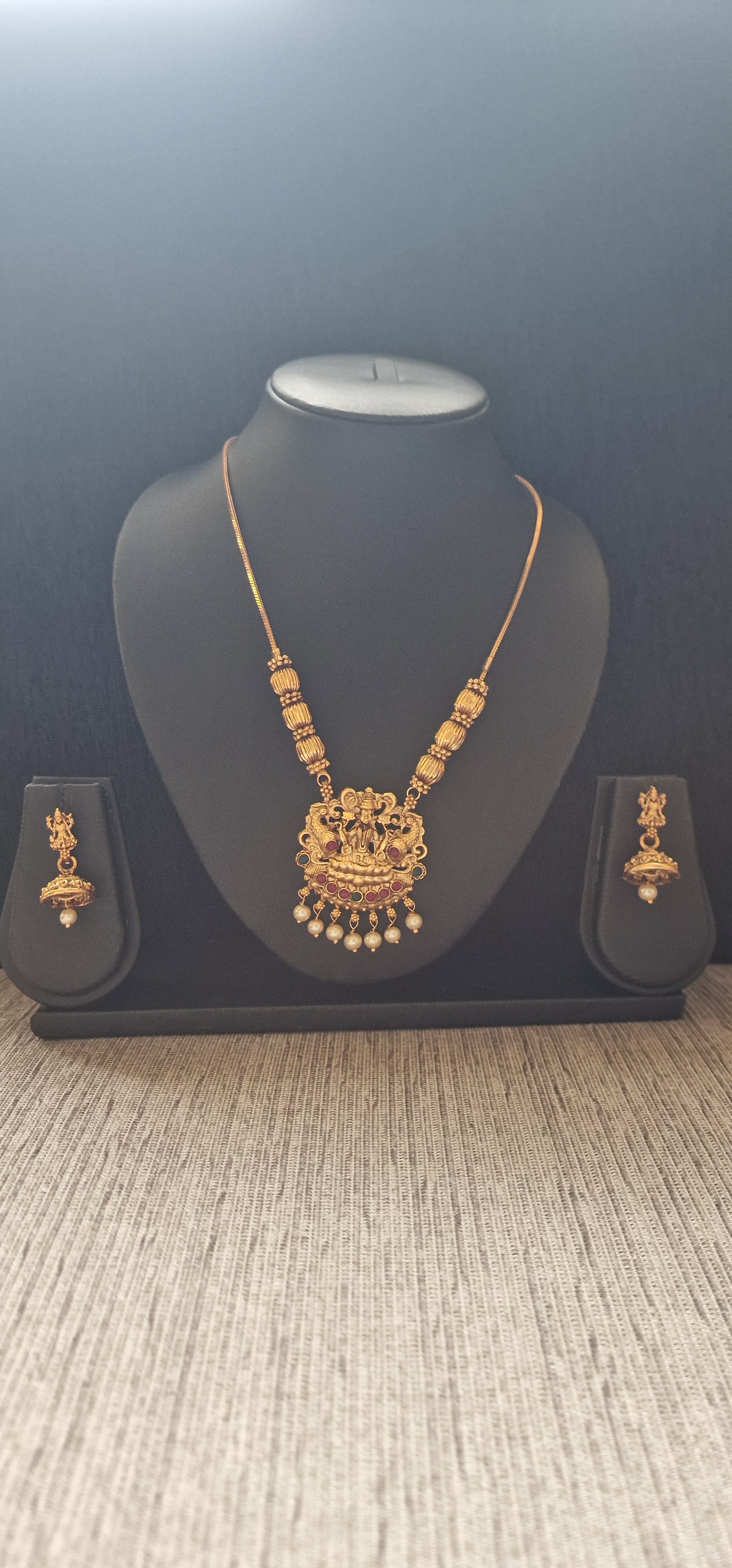 Adjustable long chain with lekshmi pendent with cute jimukha