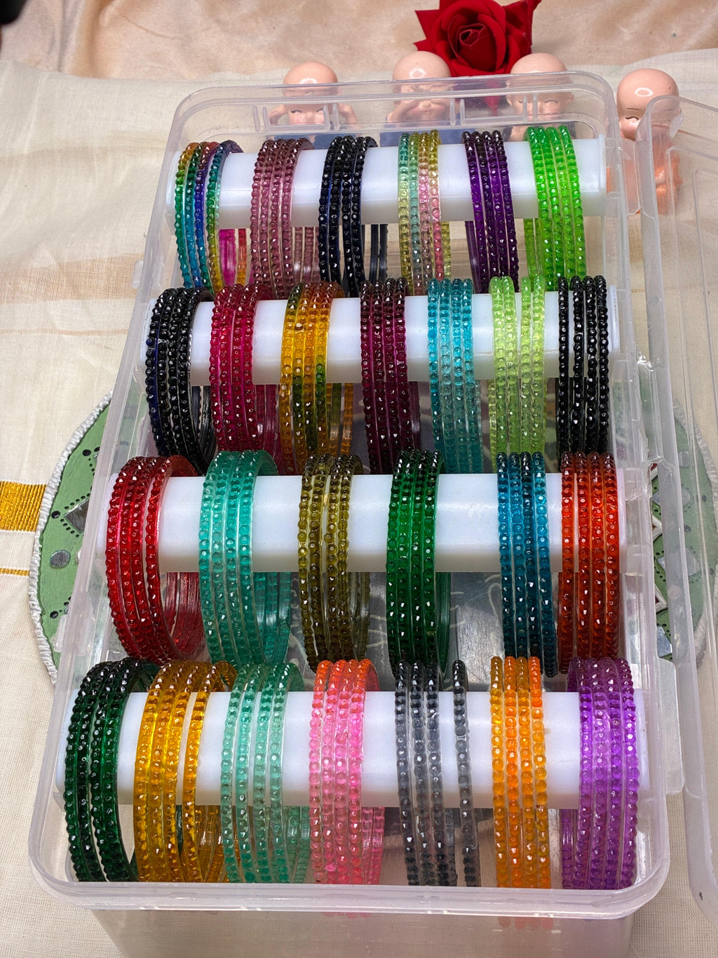 Glass bangles in ball designs