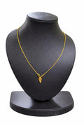 Gold covering Hindu religion thali with simple chain