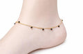 Simple black pearl hanging anklet in gold covering