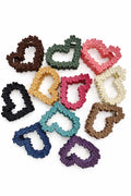 Tiny flower arranged heart shaped clutches