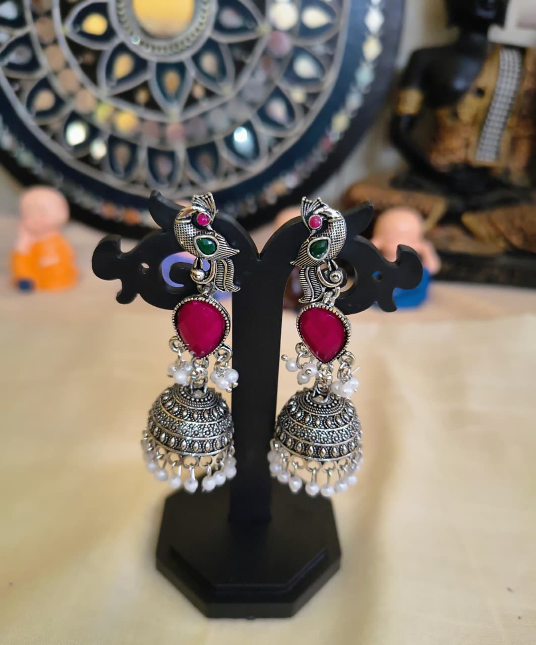 Elegant and unique white metal party wear peacock stud long hanging jimukha with stones and beads